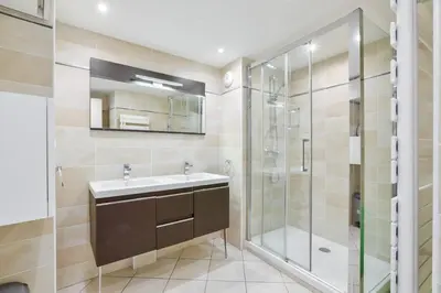 a bathroom with a sink and a shower at Charming stay in Nice in Nice