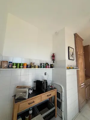 a kitchen with a counter with a microwave in it at NICE, Exceptional Sea View, Top Floor, Parking in Nice