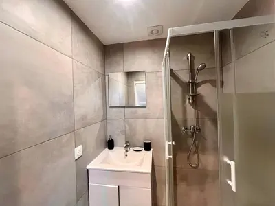 a bathroom with a shower and a sink at Nice Signature Assalit 2P in Nice