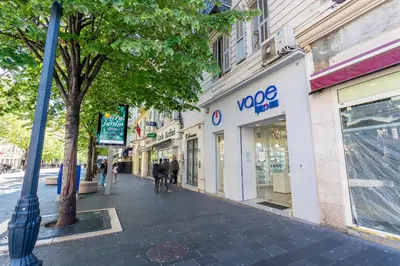 a street with a voges store on a city street at ICONIC AP4460 By Riviera Holiday Homes in Nice