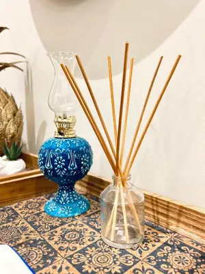 two vases sitting on a table with sticks in them at Old Town Vibes - 5min to Sea - AC & Breakfast in Nice