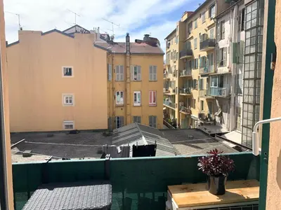 a view from a balcony of buildings at Port de nice in Nice