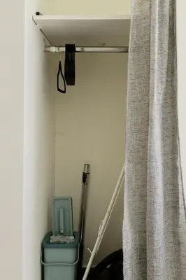 a room with a toilet and a curtain at Nice Magnan studio avec jardin proche des plages in Nice
