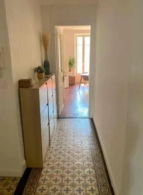 a room with a hallway with a counter and a floor at Au Passage Niçois in Nice