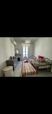 a bedroom with a bed with a rug on it at Two bedroom Apartment to rent in Nice in Nice