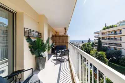 a balcony with a view of a city at MY CASA - GAIRAUT - 5 rooms - Terrasse in Nice