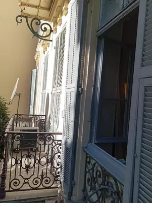 a balcony of a building with a window at Sea Side, Modern, Nice Promenade in Nice