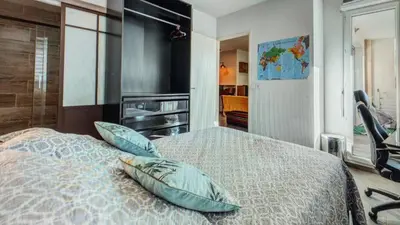 a bedroom with a bed with two pillows on it at Nice barelli in Nice