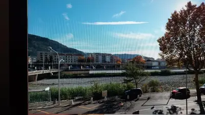 a view from a window of a parking lot at Nice barelli in Nice