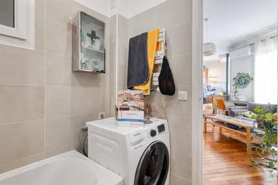 a laundry room with a washing machine in it at Cocon D'Azur - 5min from the beach - Happy Rentals in Nice