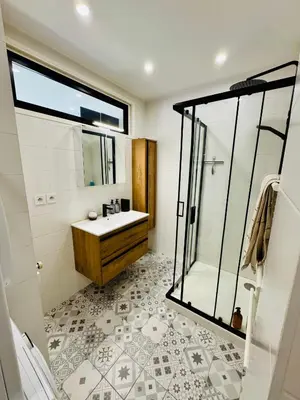 a bathroom with a shower and a sink at Nice experience in Nice