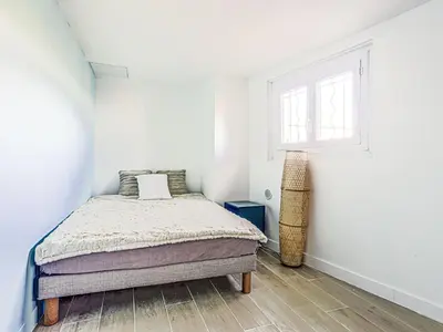 a bedroom with a bed and a window at Holiday Home Villa la Bergerie by Interhome in Nice