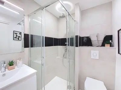 a bathroom with a shower and a sink at Apartment Le Nice Etoile by Interhome in Nice