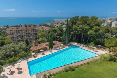 an overhead view of a swimming pool in a resort at Le rêve bleu in Nice