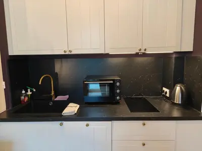 a kitchen counter with a microwave and a sink at Spacious NEW Apt near Promenade up to 6 with AC in Nice
