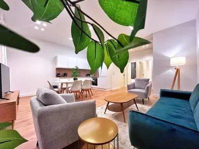 a living room with a couch and chairs and a table at RF102 - Magnifique et spacieux 3 pièces in Nice
