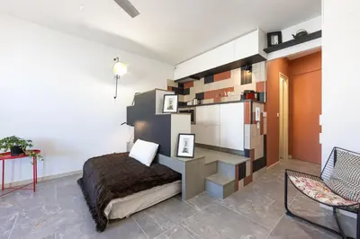 a white bathroom with a washing machine and a sink at OFF