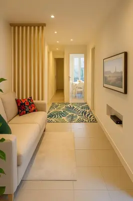a living room with a couch and a rug at Charmant appartement 3 grandes chambres au coeur de Nice au calme absolu in Nice