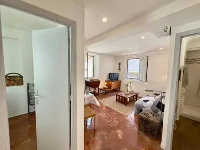 a living room with a couch and a table at Ze Perfect Place - Authentique & Calme - 1 CHB in Nice