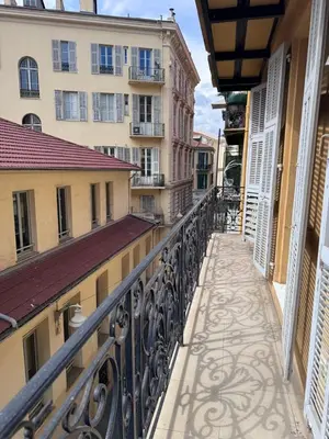 an empty balcony of a building with a railing at Beau 4 pièces - hyper centre 8 couchages in Nice
