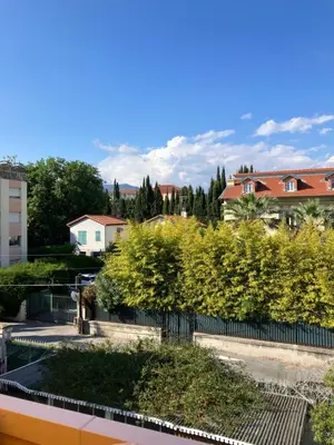 a view of a city with buildings and trees at Chambre de charme in Nice