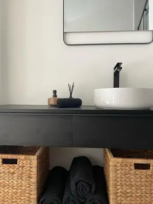 a bathroom with a sink and a mirror at Duplex Place Garibaldi - Close to port, Old Nice in Nice