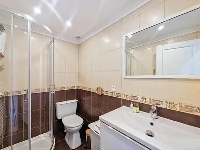 a bathroom with a toilet and a sink and a shower at Nestor&Jeeves - CASA SOLANA - Terrace - Central in Nice