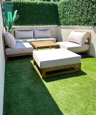 a group of beds sitting on the grass at Spacious, quiet apartment in Nice