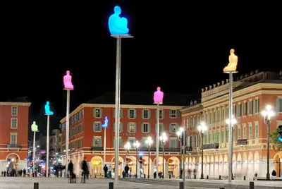 a group of street lights in front of a building at Studio Proche Tram accès Centre Ville Plage in Nice