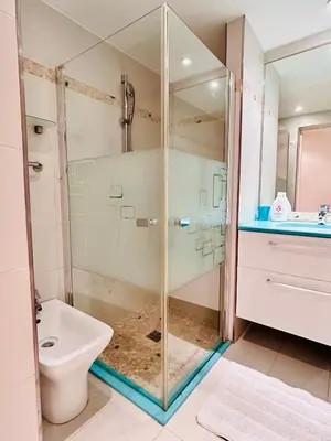 a bathroom with a shower and a toilet and a sink at Golden Mornings, Sea, Garden, Breakfast & Free Parking in Villefranche-sur-Mer