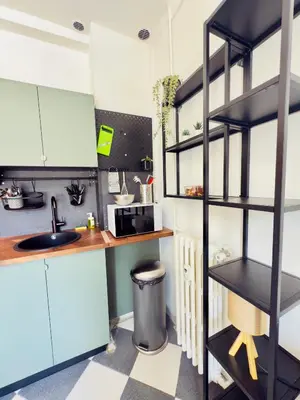 a kitchen with a sink and a shelf at New Alba 3 Pers WiFi AC in Nice