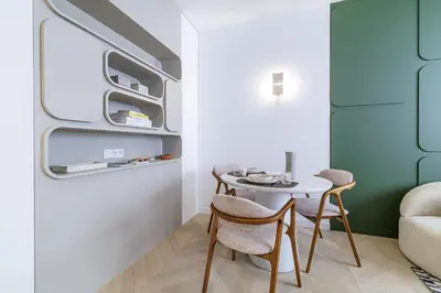 a small dining room with a table and chairs at BERLIOZ - Splendid apartment in Nice city center in Nice
