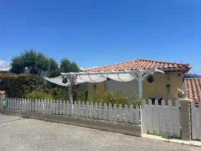 a white picket fence in front of a house at Chez Valentine in Nice