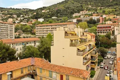 an aerial view of a city with buildings at Studio climatisé au calme, terrasse vue colline in Nice