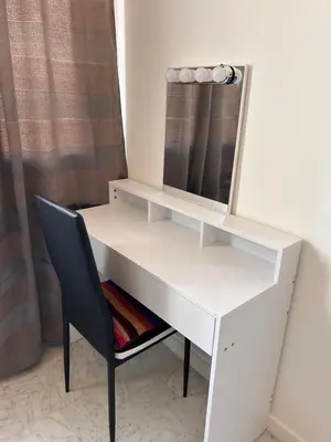 a white desk with a mirror and a chair at Dolce Vita in Nice