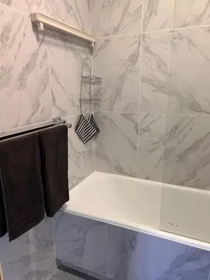 a bathroom with a shower with a bath tub at Dolce Vita in Nice