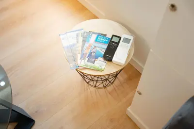 a small table with items on it in a room at Ambiance cosy a la Niçoise in Nice