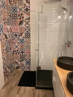 a bathroom with a shower and a sink at Large 2-room bright sea view near airport in Nice