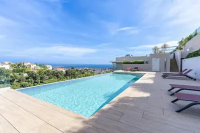 a swimming pool in a villa with a view at Azur Panoramique – Calme Vue Mer proche Nice in Saint-Laurent-du-Var