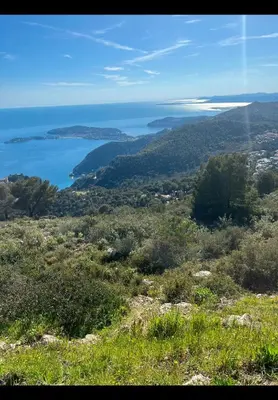 a view of the ocean from the top of a hill at Vue Mer Prestige in Villefranche-sur-Mer