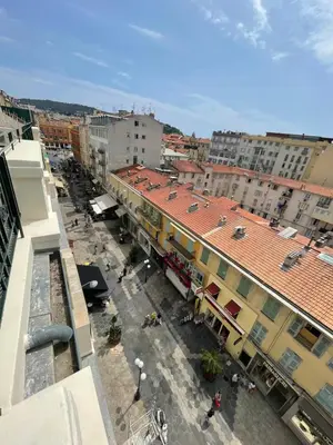 an overhead view of a city street with buildings at Sweethome Massena in Nice