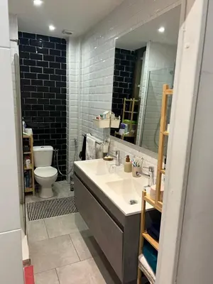 a bathroom with a sink and a toilet and a mirror at New central nice sea down town in Nice