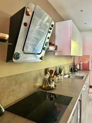 a kitchen with a sink and a microwave at Magnifique appartement - Vue mer in Nice
