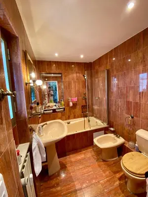 a bathroom with a tub and a sink and a toilet at NICE 2P Panoramic Sea View Wi-Fi AC in Nice