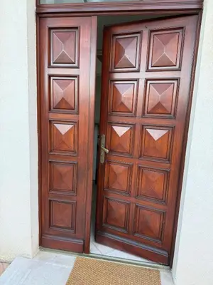 an open wooden door in a building with at Cozy Villa Saint-Jean-Cap-Ferrat in Saint-Jean-Cap-Ferrat