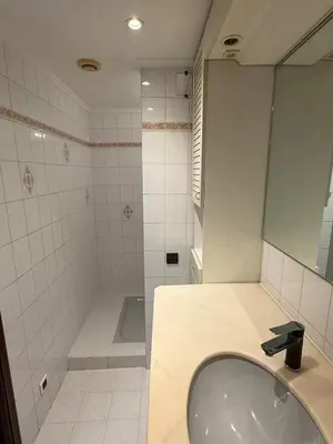 a bathroom with a sink and a shower and a tub at Cozy Villa Saint-Jean-Cap-Ferrat in Saint-Jean-Cap-Ferrat