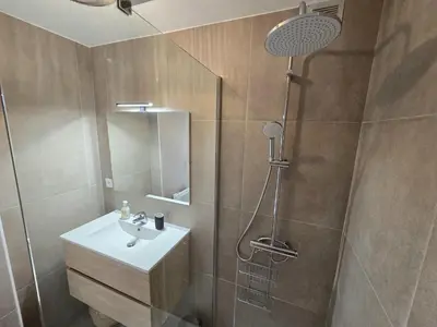 a bathroom with a sink and a shower at 