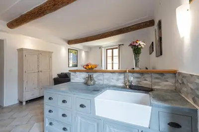 a kitchen with a sink and a counter at 
