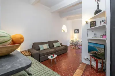 a living room with a couch and a television at 