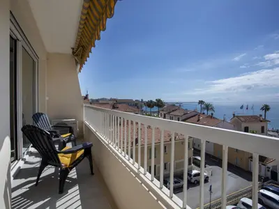 a balcony with a view of the ocean at Apartment Cros de Cagnes-2 by Interhome in Cagnes-sur-Mer